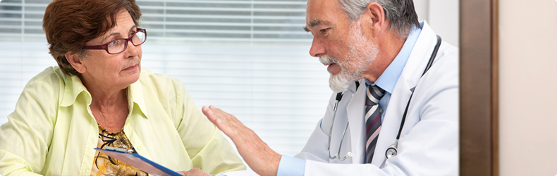 picture of woman and doctor talking picture of woman and doctor talking